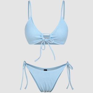82% polyester 
Spaghetti Strap 
Removable Padding
Wireless Bra
Thong